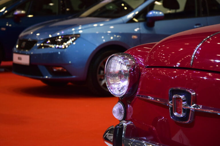 cars in a showroom waiting for upcoming auto auctions