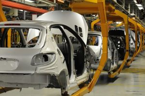 an auto manufacturing plant, which could see some changes due to 2022 in the auto industry trends.