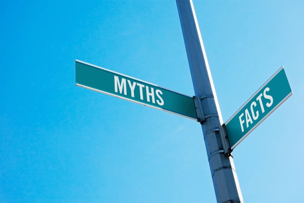 a sign showing facts and myths about the auto transport industry