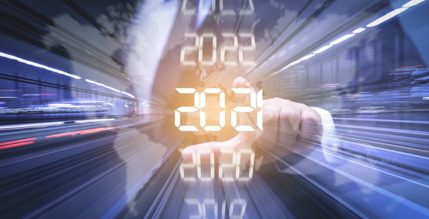 business suited figure pressing the number 2021 in a digital sequence with a high-speed blur effect laid over a global map