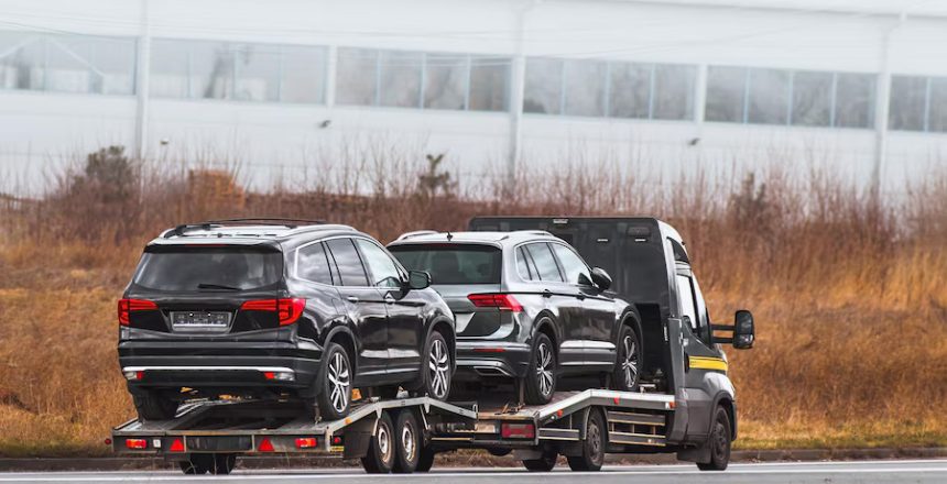 tow-truck-hauls-car-after-highway-breakdown_782515-15330 (1)