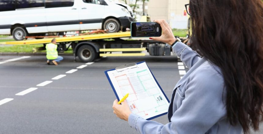woman-with-documents-hands-taking-pictures-wrecked-car-phone_151013-17744 (1)